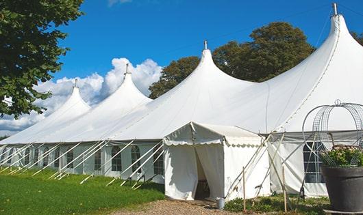 high-quality portable toilets stationed at a wedding, meeting the needs of guests throughout the outdoor reception in Avon IN